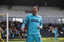 Josh Murphy celebrates his goal with the Oxford United supporters