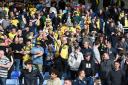 Oxford United fans celebrate against Peterborough United