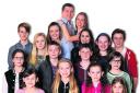 Musical leads . . . Duncan Blagrove and Kate Brock, as Capt von Trapp and Maria, with the child cast