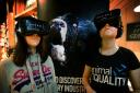 Pictured watching the virtual reality film to experience life – and death – through the eyes of cows and calves reared and killed in the dairy industry are Laura Konsek and OU Vegan Society President Isabel Barber.