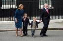 Gordon Brown leaving Downing Street with his wife and young sons