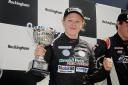Alice Powell on the podium after two victories in the F3 Cup at Rockingham Picture: Jonathan Hatfield