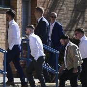 Some of the fans arrive at Swindon Magistrates' Court on Wednesday. Pictured left to right: Archie Bowman, Corey Wise, Adam Farmer, Dean Hadrell, Connor Carpenter and Lewis Jarvis. Photo: Dave Cox.