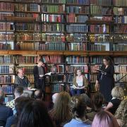 'Between Two Fires' being performed in 'The Reading Room' at the 'The London Library'