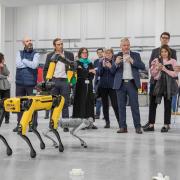 Robots SPOT and GO1 entertaining guests in new OAS building extension.
