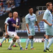 United striker James Constable (left) watches as his shot flies into the back of the Coventry City net