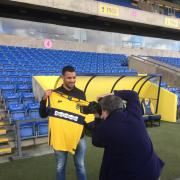 New signing Kyle Vassell with Oxford Mail photographer Jon Lewis