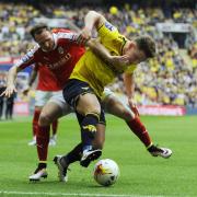 Alex MacDonald battles for the ball during Oxford United's 3-2 defeat to Barnsley in the Johnstone's Paint Trophy final at Wembley last Sunday