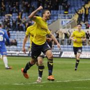 Liam Sercombe punches the air after wrapping up Oxford United's win with a late goal  Picture: David Fleming