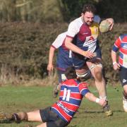 ON THE CHARGE: Allan Purchase skips past Grove’s Jorge Cabral during Oxford Harlequins’ 12-10 victory Picture: Steve Wheeler