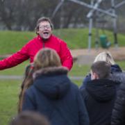 Simon Hewerdine speaks to residents as they gather on Ladygrove Park. Picture: Damian Halliwell