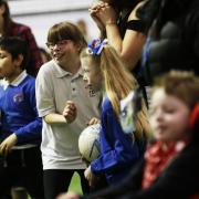 Oxford United officials train pupils in Mabel Prichard Special School.