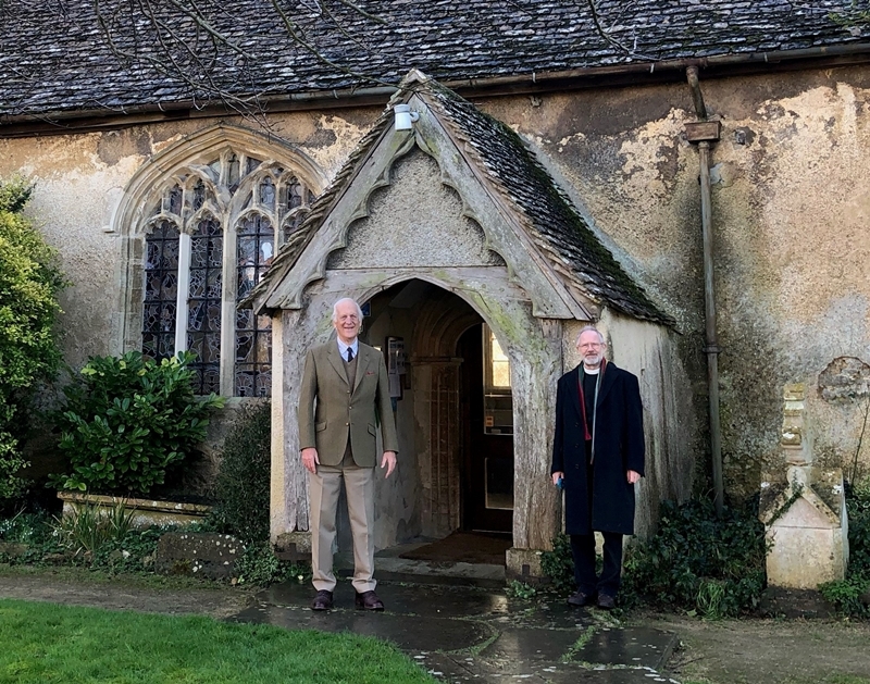 Longcot Village Trusts Keith Reid with Revd Canon Paul Richardson outside St Marys Church