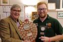 Abingdon Vale 2nd team captain Matt Darley with the Cherwell League award and Abingdon president Julian Shellard