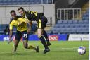 Derick Osei scores in Oxford United's group game with Bristol Rovers last month   Picture: David Fleming