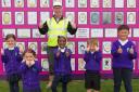 Justin Daley, development project manager for Care UK, and pupils from Wantage Primary Academy