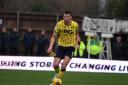 Oxford United captain Elliott Moore has missed the last three games with a hip problem