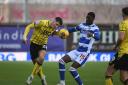 Stephan Negru gets a head on the ball against Reading