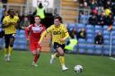 Oxford United winger Tyler Goodrham surges forward against Leyton Orient
