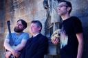 Chris Beard (in t shirt), Tom McDonnell (in suit) and Phil Oakley (with bushy beard) at St John the Evangelist Church Oxford. Picture by Tim HughesPromoting Shakespeare themed event - The Food of love project at SJE Arts - Friday 22nd April