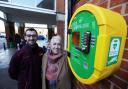 Luke Dady and Jane Fallon-Norris with the newly installed defibrillator at Sainsbury's in Wantage