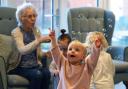 CARE: Baby group’s visits to care home help elderly lady recover from stroke. Picture by Elmbrook Care Home