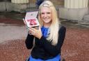 STAR: Jordanne Whiley, pictured holding her MBE in 2015, is targeting a return to the court in November Picture: John Stillwell/PA Wire