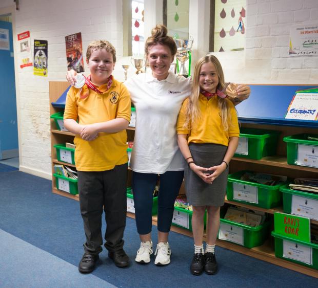 Herald Series: Steventon resident Jordanne Whiley, who won silver and bronze in the doubles and singles respectively at the Paralympics this summer, popped in to St Michael’s CE Primary School. Picture: Scott Heavey