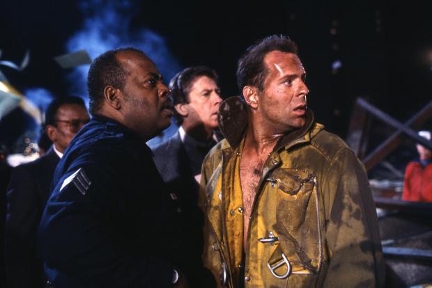 Herald Series: Reginald VelJohnson and Bruce Willis in Die Hard. Credit: Disney 