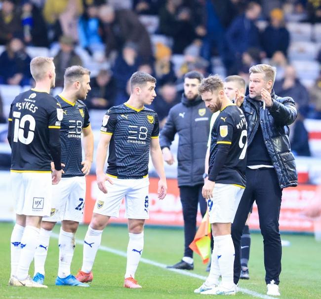 Karl Robinson instructs his players during Oxford United's defeat at Lincoln City Picture: Steve Edmunds