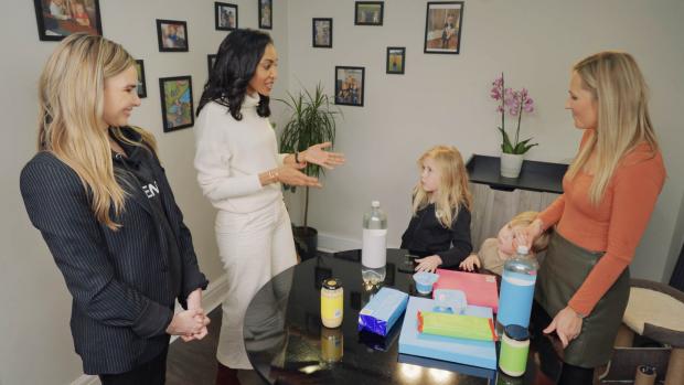Herald Series: Former Girls Aloud member Nadine Coyle, dietician Dr Linia Patel and a Netmums family testing the app in a new film supporting a campaign to help families eat better (PA)