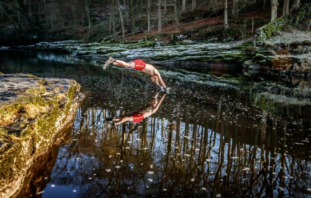 Herald Series: Wild swimming has grown in popularity in the UK (PA)