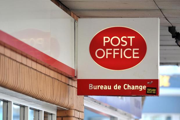 Herald Series: Post Office sign. Credit: PA