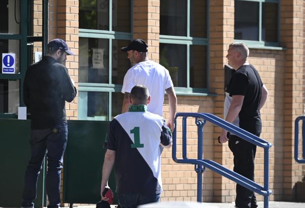 Herald Series: Ashley Northmore (left), Steven Ellis (centre, in baseball cap) and Shannon Power (right) outside Swindon Magistrates' Court on Wednesday. Photo: Dave Cox.