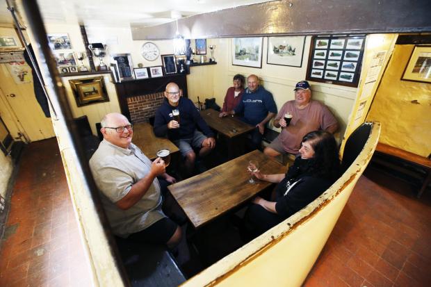 Herald Series: People enjoying a drink at the unique pub (Ed Nix)