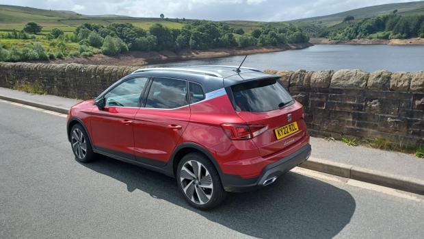 Herald Series: The SEAT Arona on test in West Yorkshire, pictured next to Digley Reservoir in Kirklees (left) and near Castle Hill, Huddersfield (top left)