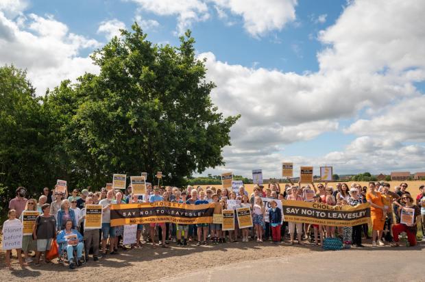 Herald Series: Residents protested next to the land proposed for development in Cholsey