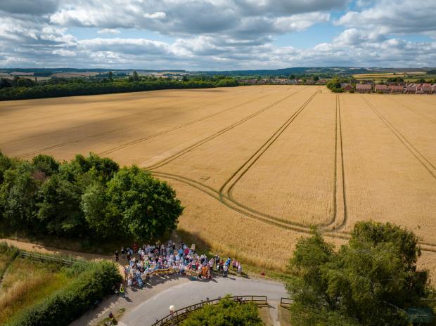 Herald Series: Residents protested next to the land proposed for development in Cholsey