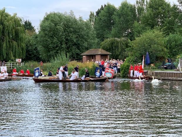 Herald Series: The Swan Upping crew passing the Wallingford Accessible Boat Club 