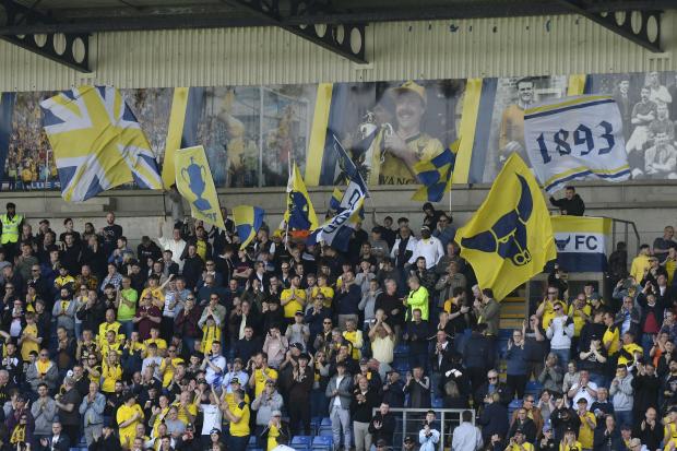 Herald Series: Oxford United fans at the final game of last season, against Doncaster Rovers. Picture: David Fleming