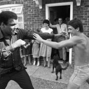 Muhammad Ali spars with Paddy Monaghan's son Tyrone