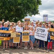 Residents protested next to the land proposed for development in Cholsey