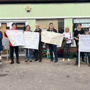 PROTEST: Customers outside Changing Lives hoping to find the store a new building