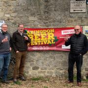 Bryan Brown (chair of Abingdon Abbey Buildings Trust). Andrew McLeod (Secretary) and William - a beer festival volunteer. Credit: Meg Minion