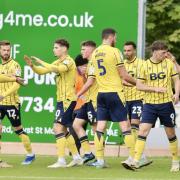 Oxford United celebrate against Exeter City