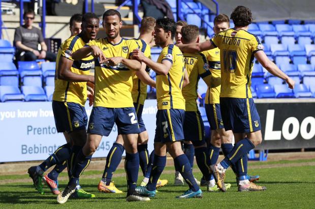 Kemar Roofe celebrates the first of his two goals Picture: Richard Parkes
