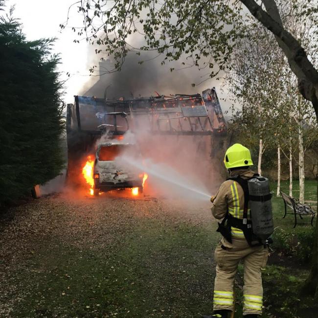 PICS: Firefighters tackle van blaze seen 'for two miles'